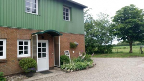 Thomsen - familienfreundliche Ferienwohnung mit großem Garten, Tarp
